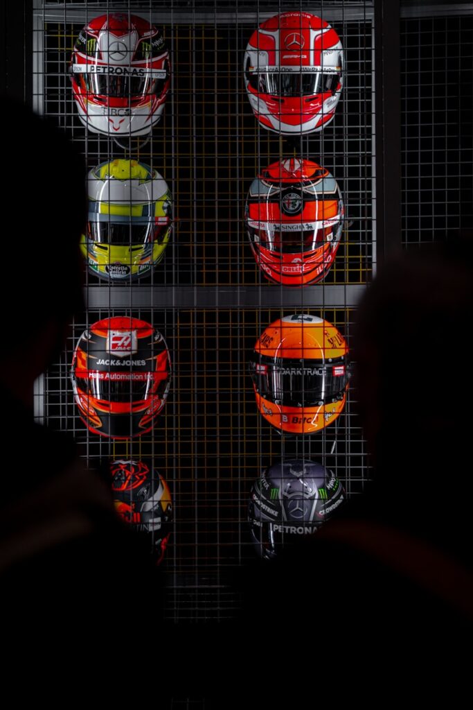 a number of helmets on display in a room